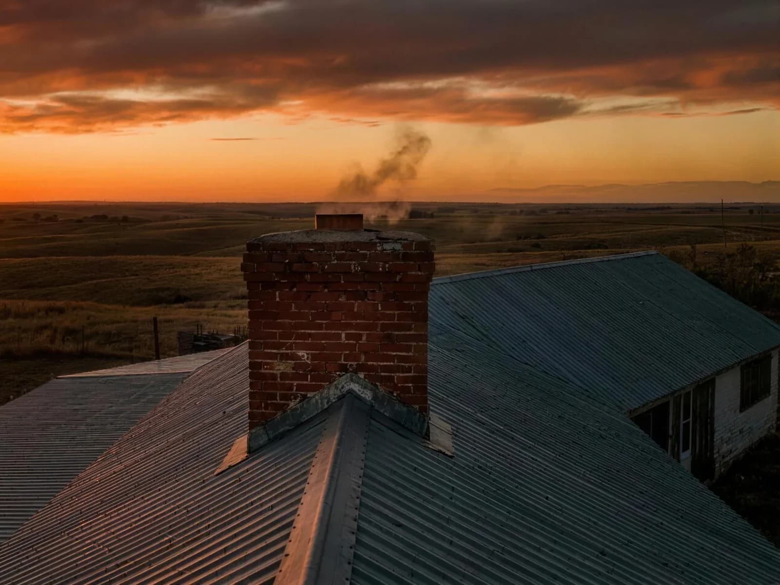 Brick chimney on a Texas Panhandle rooftop