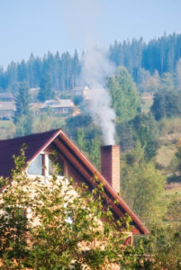 house with chimney and smoke